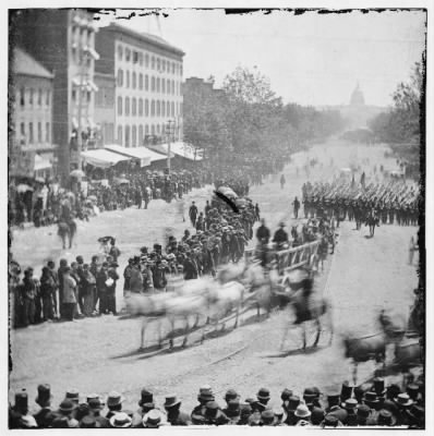 Thumbnail for 1315 - Washington, District of Columbia. Grand Review of the Army. Infantry unit with fixed bayonets followed by ambulances passing on Pennsylvania near the Treasury