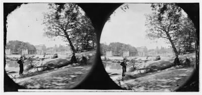 1370 - Richmond, Virginia. Ruins of Richmond & Danville Railroad bridge: the city beyond