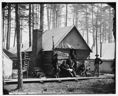 1707 - Brandy Station, Va. Officers in front of winter quarters at Army of the Potomac headquarters