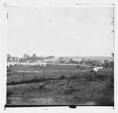 1928 - Culpeper, Virginia. Distant view of town and Federal camp