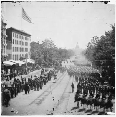 1932 - Washington, D.C. Infantry units with fixed bayonets passing on Pennsylvania Avenue near the Treasury