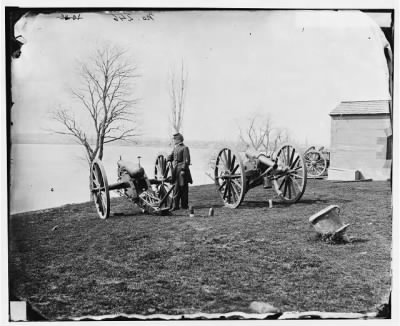1957 - Washington, D.C. Two Wiard guns at the Arsenal; Gen. Daniel E. Sickles by the left-hand one