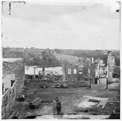2134 - Richmond, Va. Ruins of Richmond & Petersburg Railroad bridge; south bank of the James beyond