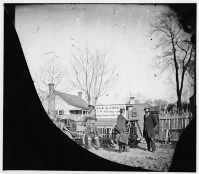 216 - Unknown location. Wagons and camera of Sam A. Cooley, U.S. photographer, Department of the South