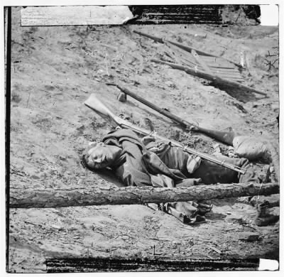 2354 - Petersburg, Va. Dead Confederate soldier with gun