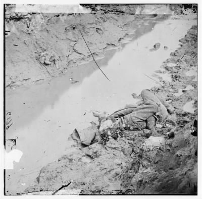 Thumbnail for 2694 - Petersburg, Virginia. Dead Confederate soldier in the trenches of Fort Mahone