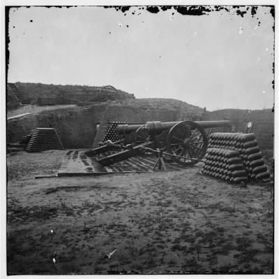 2742 - Morris Island, S.C. Two 100-pdr. Parrott guns and stacks of shells inside Fort Putnam