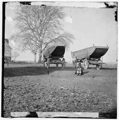 2820 - Unknown location. Pontoon boats on wheeled carriages