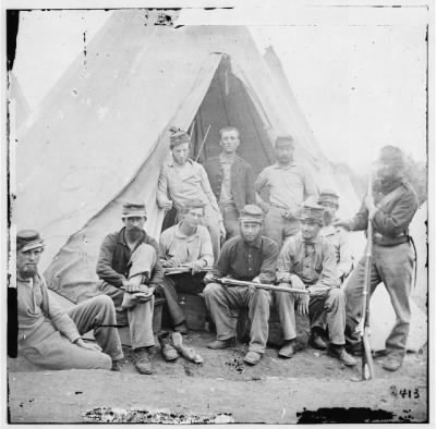 2957 - Group of soldiers of Company G, 71st New York Vols. In front of 'Sibley' tent