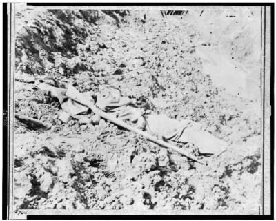 3325 - Dead Confederate soldier in trench at Fort Mahone, Petersburg, Va., April 3, 1865