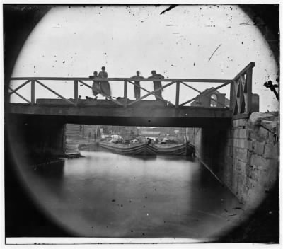 4920 - Richmond, Va. Bridge over the Canal; barges beyond
