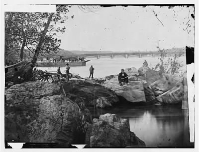 5178 - Washington, D.C. Georgetown ferry-boat carrying wagons, and Aqueduct Bridge beyond, from rocks on Mason's Island