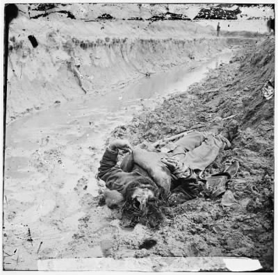 6450 - Petersburg, Virginia. Dead Confederate soldier in trenches of Fort Mahone