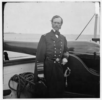 Thumbnail for 734 - Charleston Harbor, South Carolina. Rear Adm. John A. Dahlgren standing by a Dahlgren gun on deck of U.S.S. PAWNEE