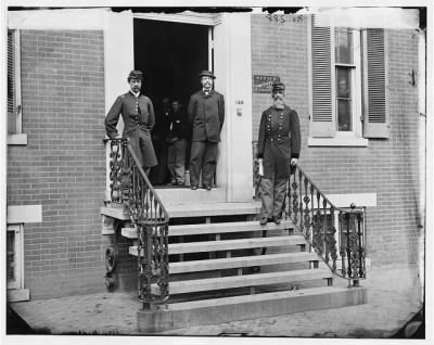 Thumbnail for 752 - Washington, D.C. Gen. William Hoffman, Commissary General of Prisoners (at right) and staff on steps of office, F. St. at 20th NW