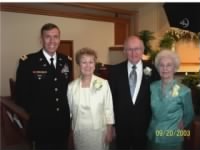 R) Mr and Mrs. Bob Crouse with daughter Betty and her husband.  2003
