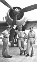 The crew and their plane on Guam