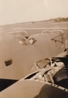 Thomas P "Rabbi" Nally in the cockpit of a B-24