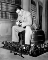 Glenn Ford cleaning his pipes
