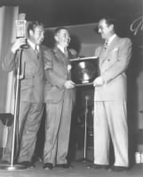 First gold record award presented to Glenn Miller by RCA Victor, 1942