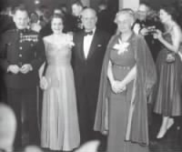 Major General Lewis B “Chesty” Puller and General Holland M. “Howlin’ Mad” Smith (Ret) and their wives at the Marine Corps Ball, 1953.