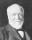 479px-Andrew_Carnegie,_three-quarter_length_portrait,_seated,_facing_slightly_left,_1913-crop.jpg