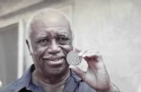 Mack-Robinson-with-Silver-Medal.jpg