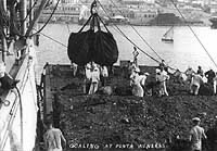 USS Maryland taking on coal 1912