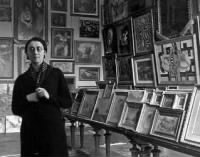 Rose Valland with paintings.jpg