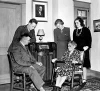 Listening to the radio for election results regarding the election of Harry S. Truman as Vice-President Elect, are Senator Truman's family..jpg