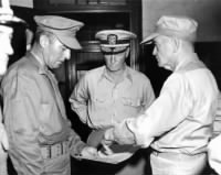 Brigadier General William T. Clement, USMC (left), Fleet Admiral Chester W. Nimitz, USN (center) and Admiral William F. Halsey, USN (right.jpg