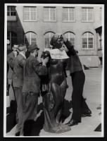 Six men prepare an Aristide Maillol sculpture looted during World War II for transport to France.jpg