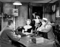 With Fred MacMurray (r.) in Borderline (1950).jpg