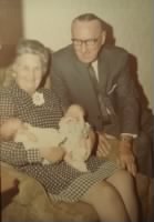 Irwin and Gertrude Hopkins holding great grandchildren SEP 1970.JPG