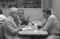 Marvin Miller (l.) sits with Joe Niekro (c.) and Nolan Ryan at a coffee shop.jpg