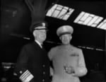 Admiral Stark and General Eisenhower awaiting President Truman.jpg
