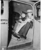 L_to_R,_Adm._Harold_Stark_and_Gen._Dwight_D._Eisenhower_in_car_preparing_to_ride_in_a_procession_behind_President..._-_NARA_-_19.jpg