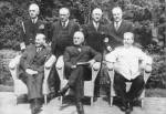 Clement Attlee, Harry S. Truman, Joseph Stalin; behind William Daniel Leahy, Ernest Bevin, James F. Byrnes and Vyacheslav Molotov..jpg