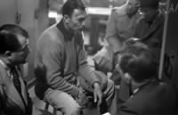 Ben Hogan faces reporters during his return to the PGA Tour in the Los Angeles Open, January 1950..jpg