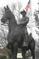 Statue_of_president_Theodore_Roosevelt_in_his_rough_rider_uniform_on_horseback.jpg