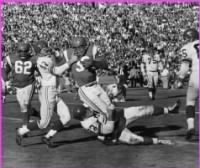 1962 Pro Bowl  Jesse Whittenton-47 and Gino Marchetti bring down Jim Brown.jpg