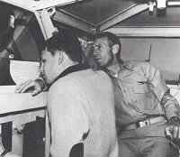 Captain Morrison and his son Jim on the bridge of the Bon Homme Richard in January 1964.jpg