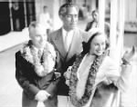 Duke Kahanamoku, with Charlie Chaplin and Chaplin's wife Paulette Goddard, 1938..jpg