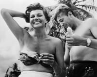 2591-Robert Mitchum-Rita Hayworth 1957.jpg