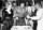 Liberace, Tom Jones, Liberace uses his famed candelabra to light candles on a birthday cake for singer Tom Jones,left to right- Joan Rivers, Joey Heatherton,Sonny Bono, Dionne Warwick, Debby Reynolds.jpg