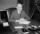 Stanley Forman Reed at desk.jpg