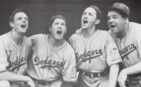 dodger-outfielders-tuck-stainback-buddy-hassett-kiki-cuyler-with-babe-ruth-their-first-base-coach-1938.jpg