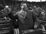 William Wrigley Jr. throws out the first ball for opening day at Wrigley Field, circa April 22, 1930..jpg