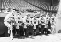 Charlie Grimm, from left, Rogers Hornsby, Footsie Blair, Woody English, Billy Jurges, Clyde Beck and Les Bell are members of the 1930 Chicago Cubs posing in the dugout at Wrigley Field..jpg