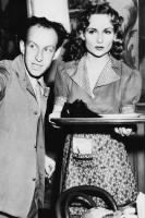 Carole Lombard gets directions from Garson Kanin.png